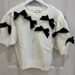 Day + Moon Women's White Sweater with Black Bows